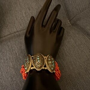 Artisan Made Multi Strand Coral Bead Gold Tone Bracelet with Turquoise Chips.